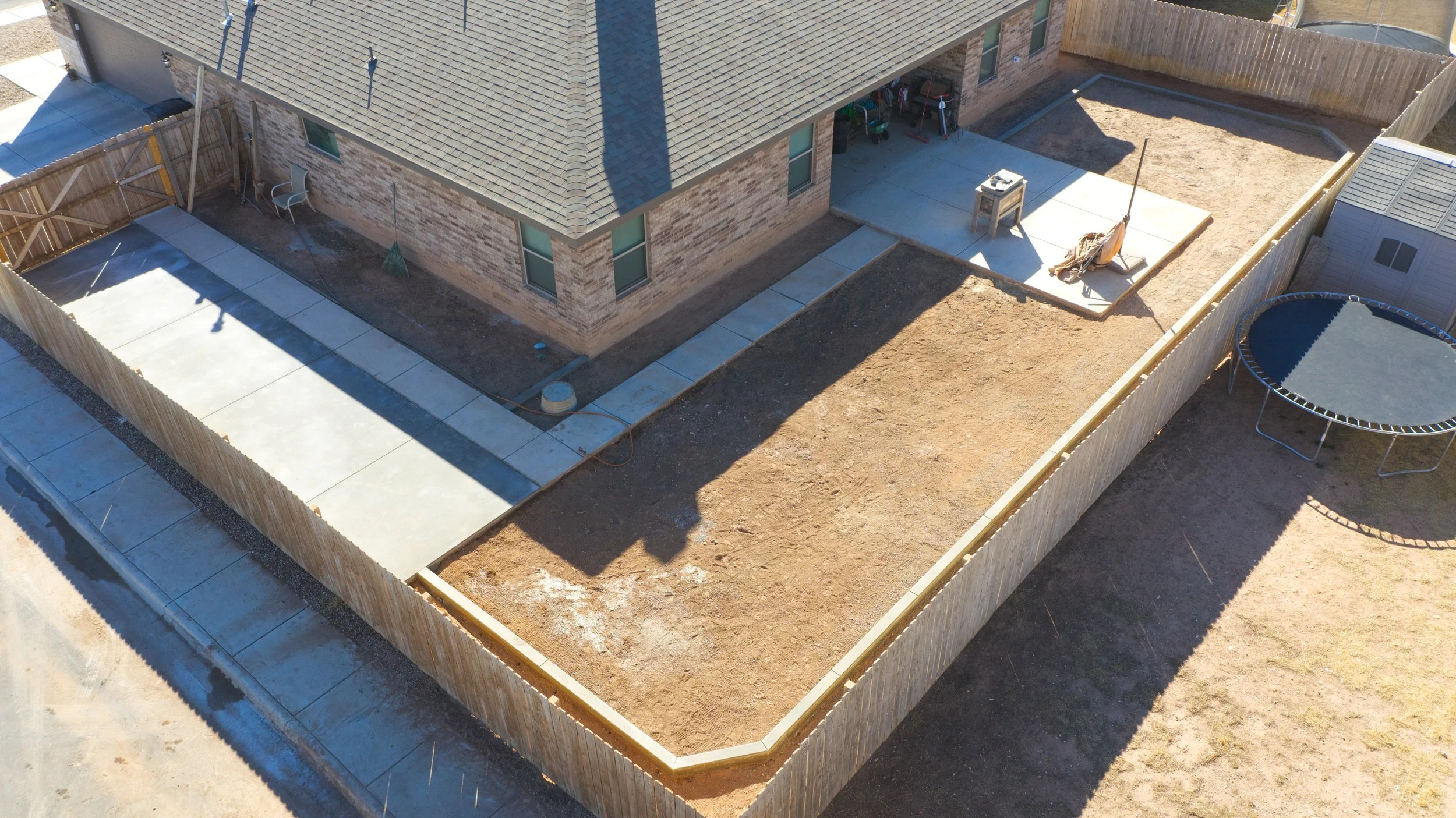 Unfinished yard before landscape design in Odessa, TX